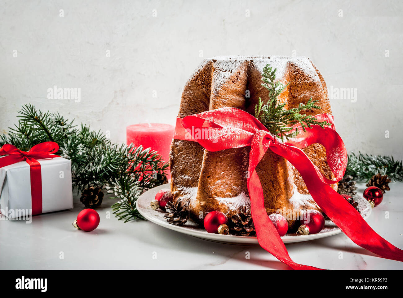 Traditional Italian Christmas fruit cake Pandoro with festive