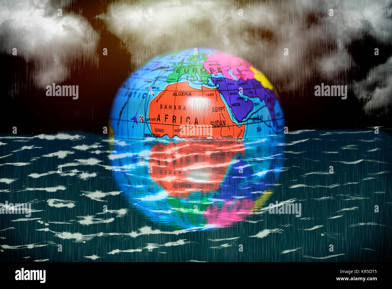 Earth globe in the water, symbolic photo climate change, Erdglobus im Wasser, Symbolfoto Klimawandel Stock Photo