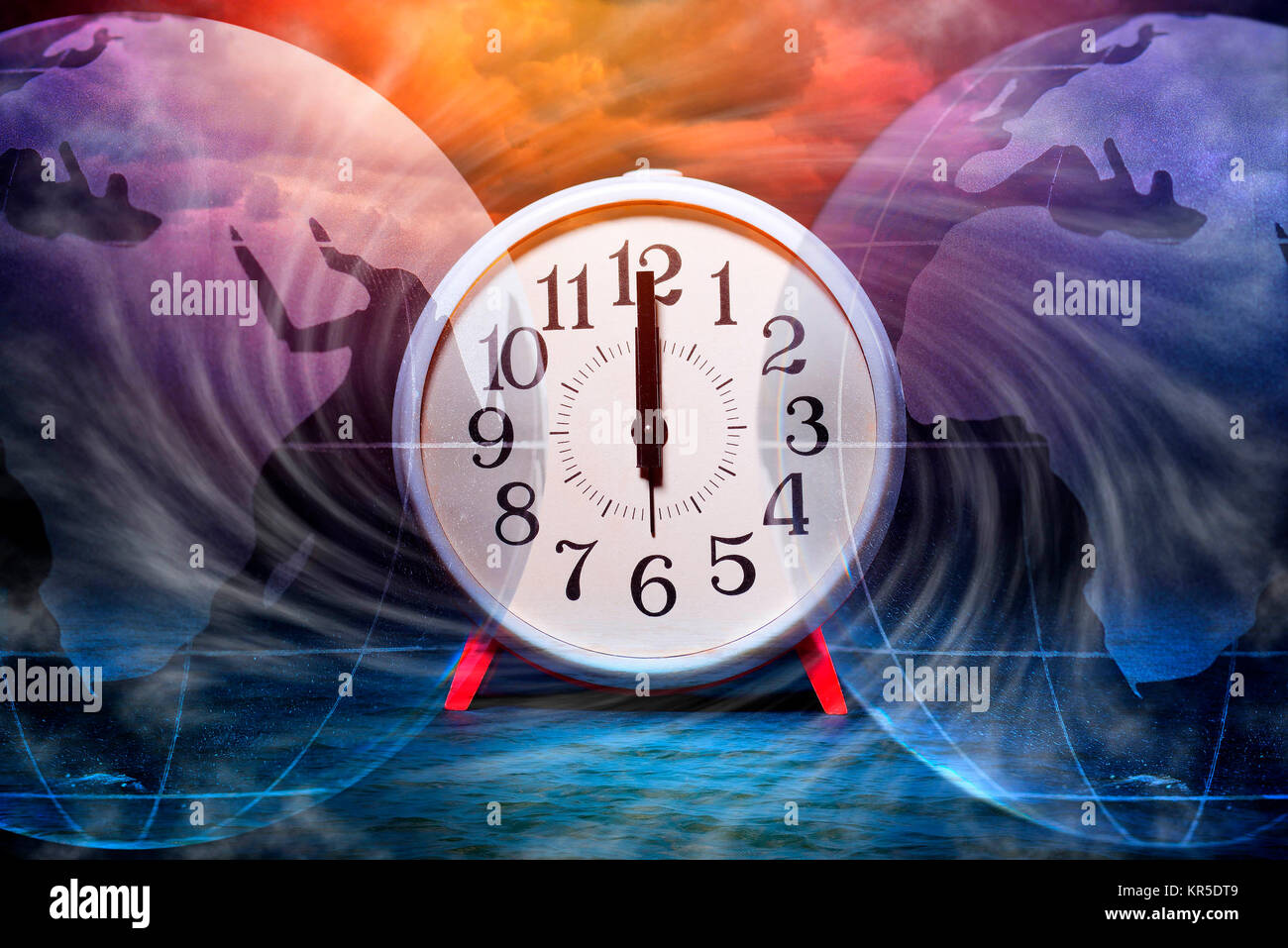 Alarm clock on 12 o'clock and globe, symbolic photo climate change, Wecker auf 12 Uhr und Erdkugel, Symbolfoto Klimawandel Stock Photo
