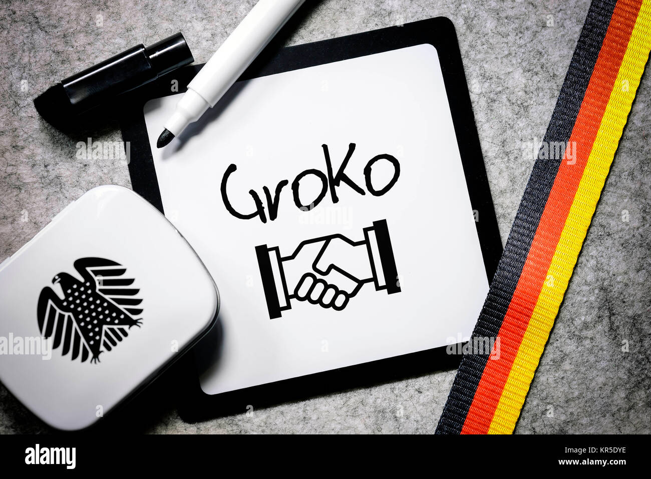 Writing board with the label GroKo, symbolic photo for grand coalition, Schreibtafel mit der Aufschrift GroKo, Symbolfoto für Große Koalition Stock Photo