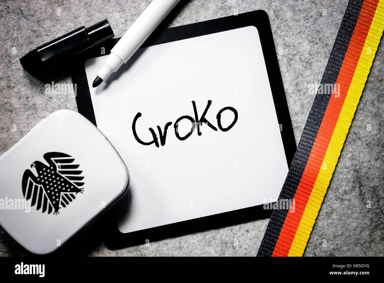 Writing board with the label GroKo, symbolic photo for grand coalition, Schreibtafel mit der Aufschrift GroKo, Symbolfoto für Große Koalition Stock Photo