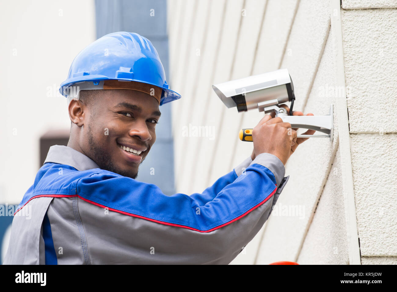 Male Technician Repairing Camera Stock Photo Alamy