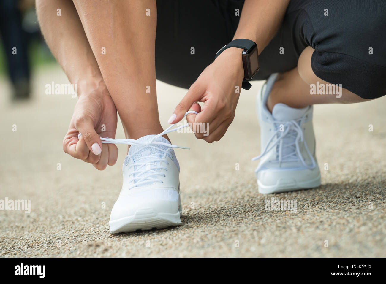 Photo inspiration: Gallery Detail: Athlete Tying Shoelaces Stock Photo