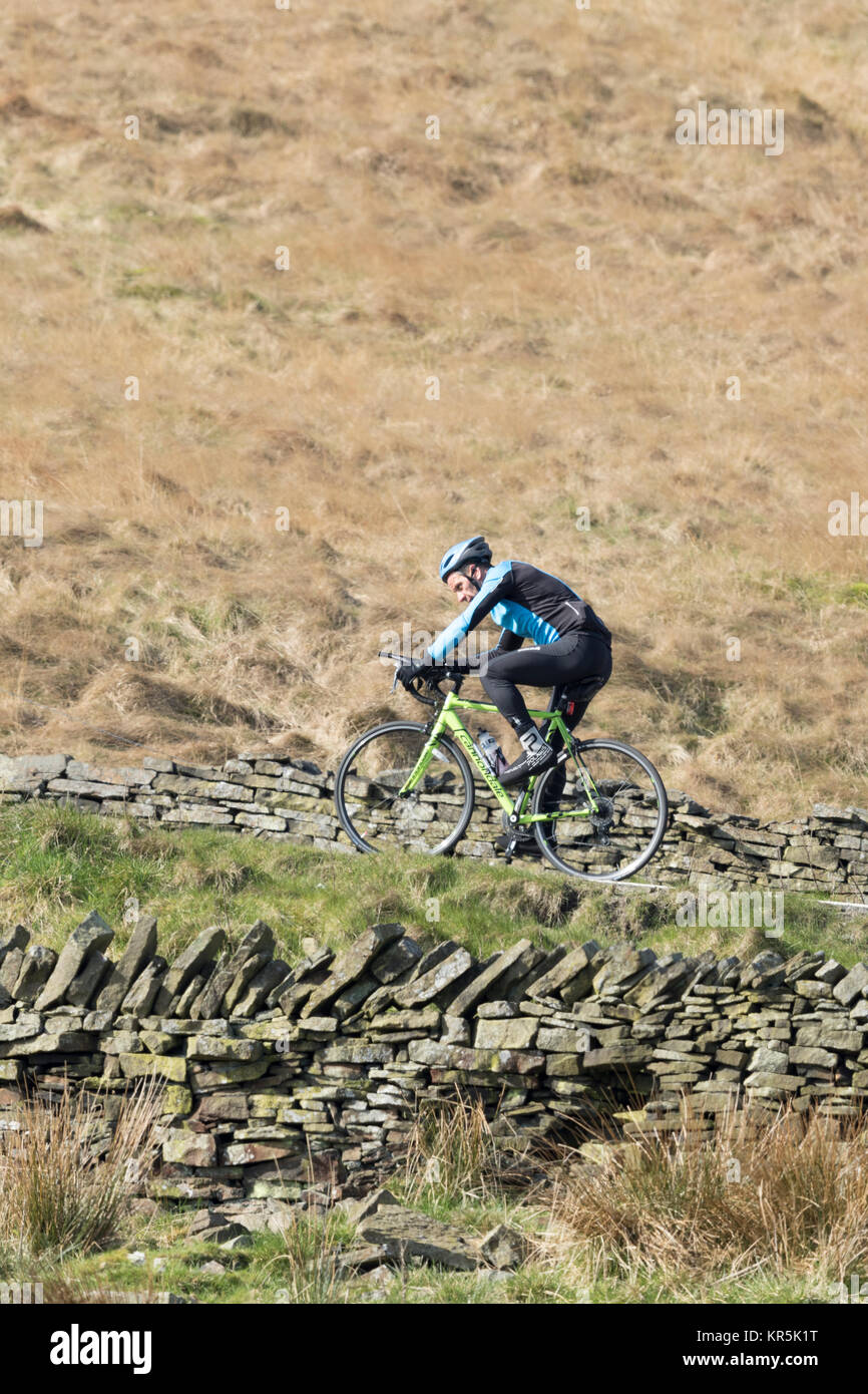 Peak District, West Yorkshire, Holmfirth, cyclists climbing Holme Moss