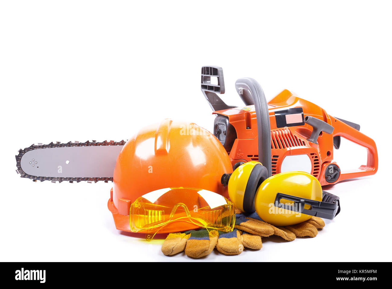 Chain saw and protective clothes. Stock Photo