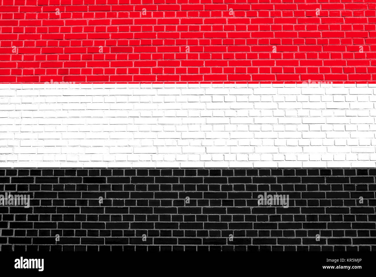 Flag of Yemen on brick wall texture background Stock Photo - Alamy