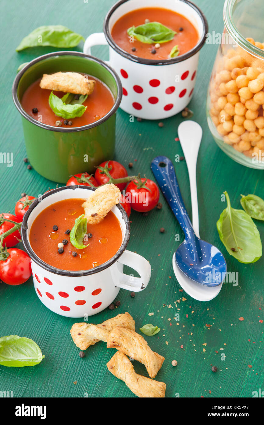 tomato soup in a rustic cup Stock Photo