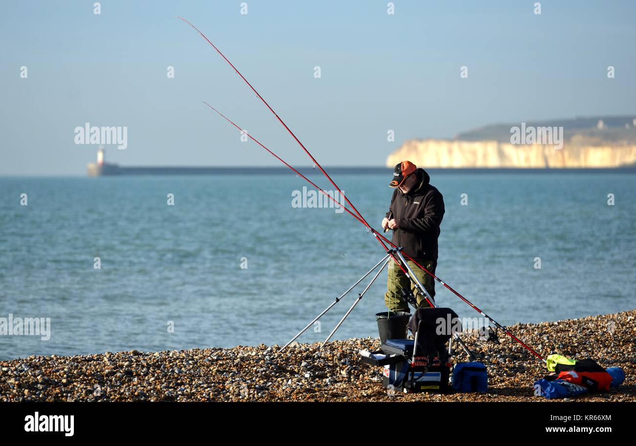 Seaford, East Sussex, UK. 19th Dec, 2017. People enjoying bright winter sunshine on Seaford beach, Eas Sussex. Credit: Peter Cripps/Alamy Live News Stock Photo