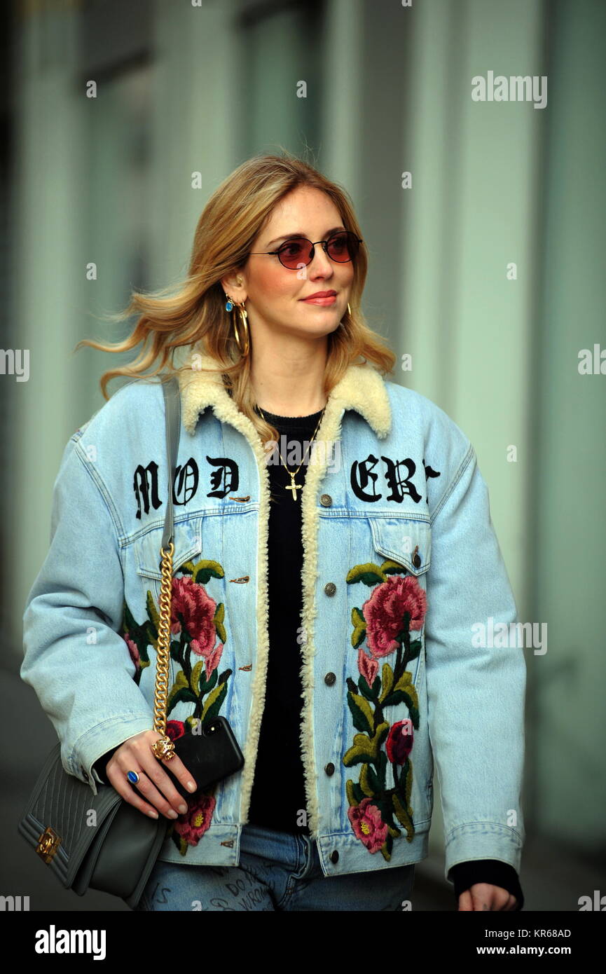 Milan, Chiara Ferragni leaves the bistro after having lunch with her friend Chiara Ferragni, at 6 months of pregnancy, surprise while leaving the bar-bistro in the Duomo area. After eating together with a friend, Chiara Ferragni allows herself a walk through the streets of the center, before returning home. Stock Photo