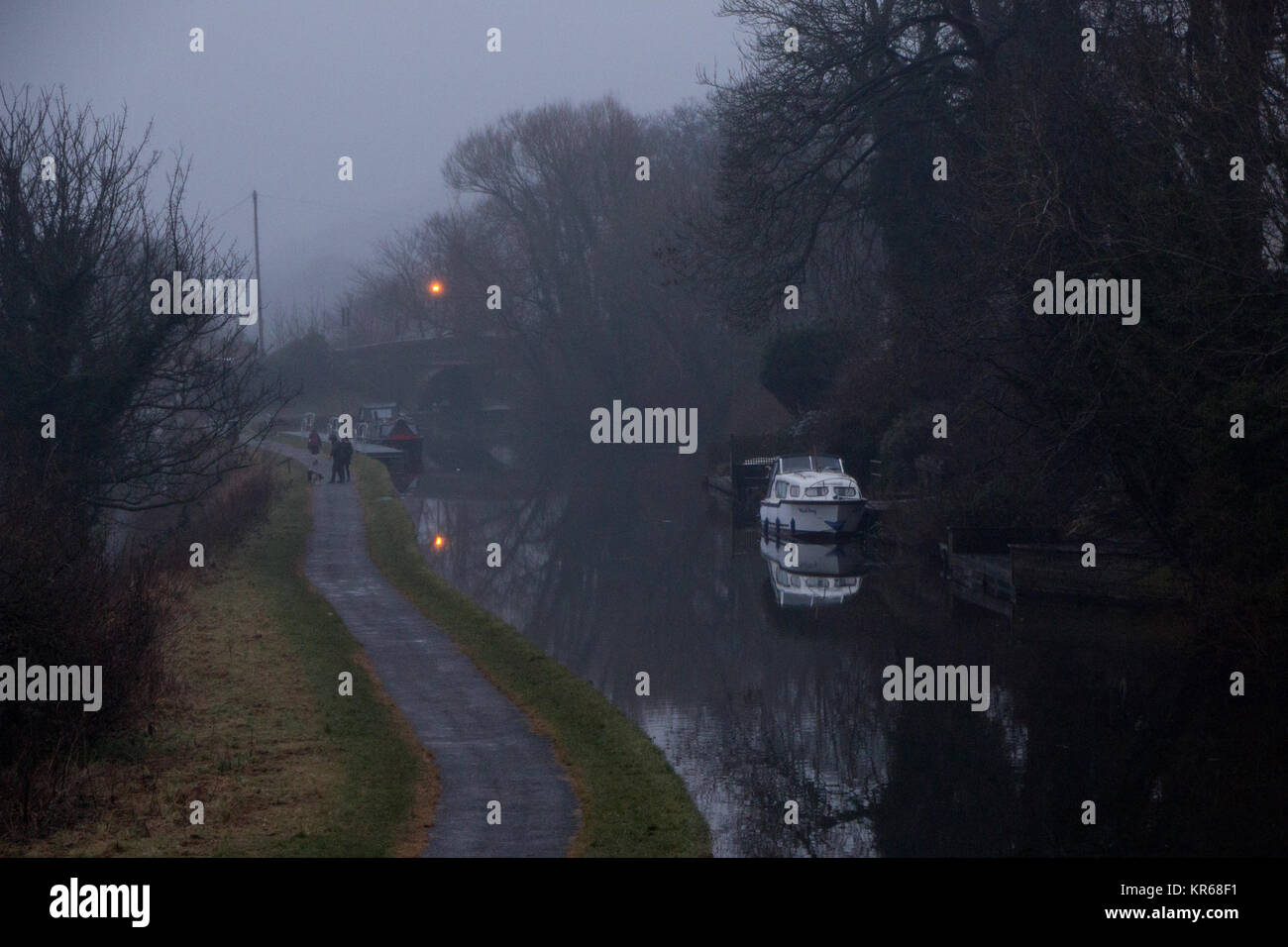 Bolton le sands Lancashire, UK. 19th December, 2017. Looking through the mist and rain down the tow path of the Lancaster Canal at Bolton le Sands Credit: David Billinge/Alamy Live News Stock Photo