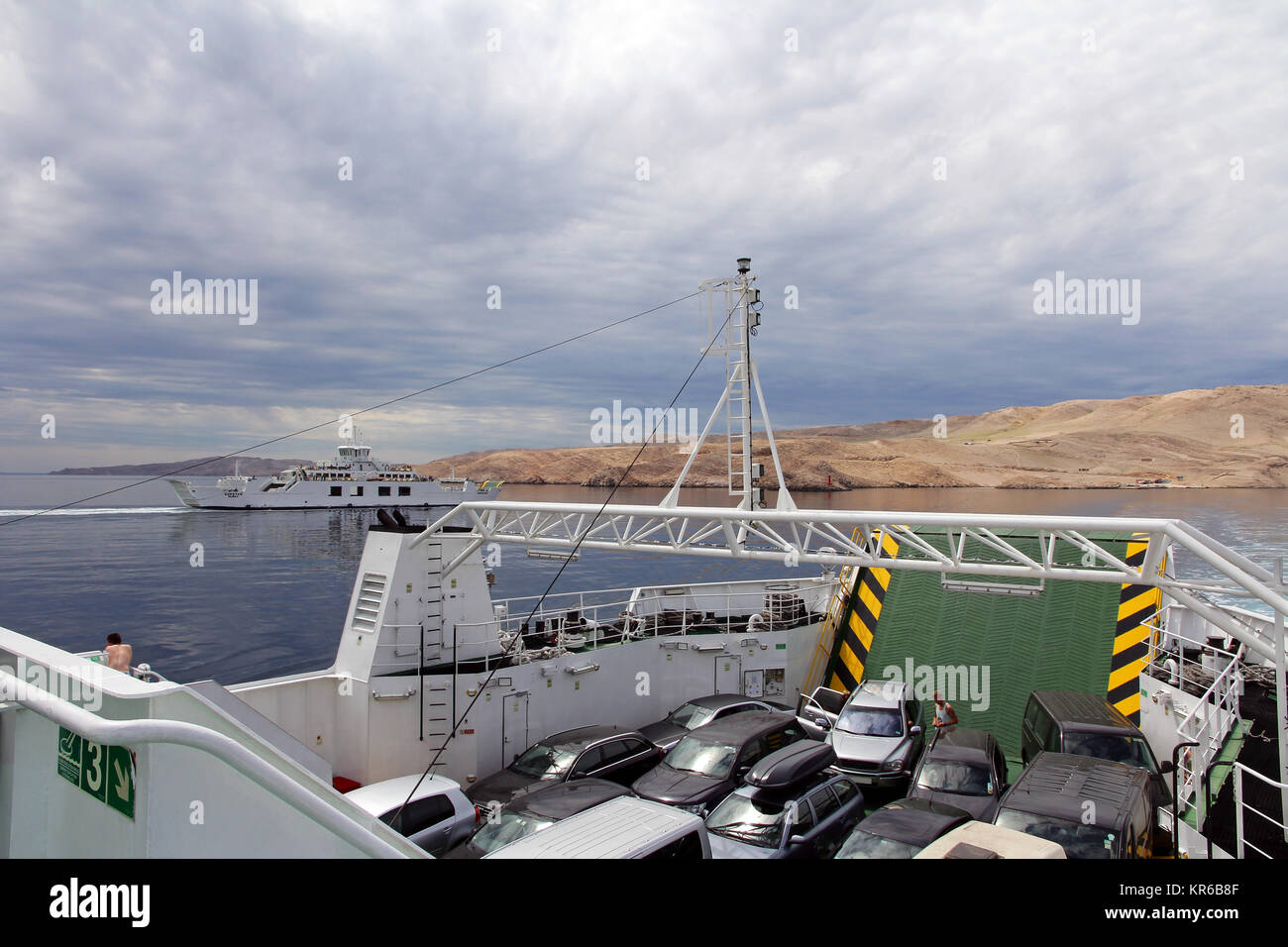cars on a car ferry in the mediterranean. a fully loaded car ferry