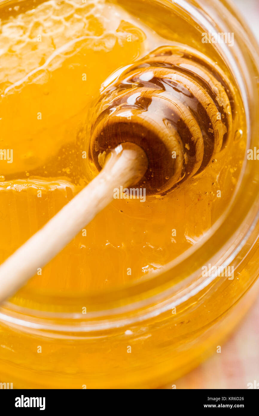 Wooden honey stick Stock Photo Alamy
