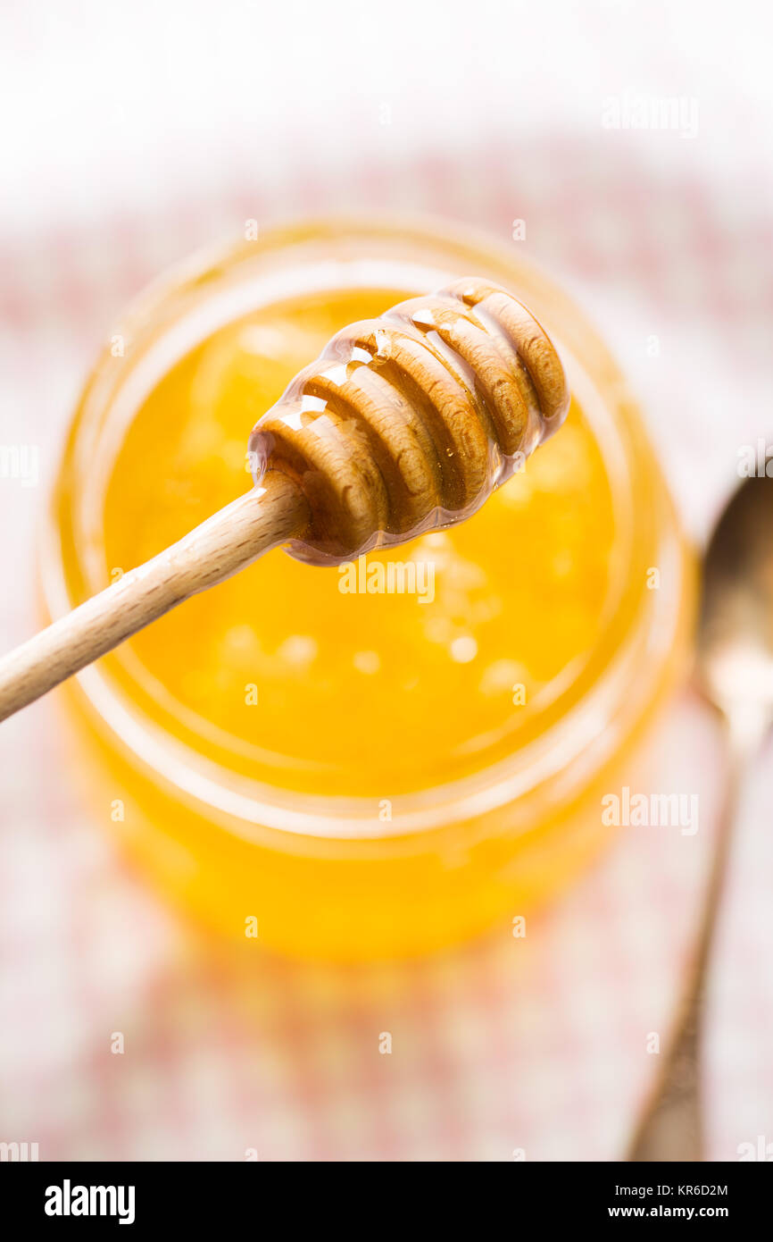 Wooden honey stick Stock Photo Alamy