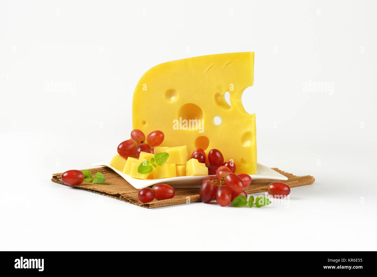 Swiss cheese and red grapes Stock Photo Alamy