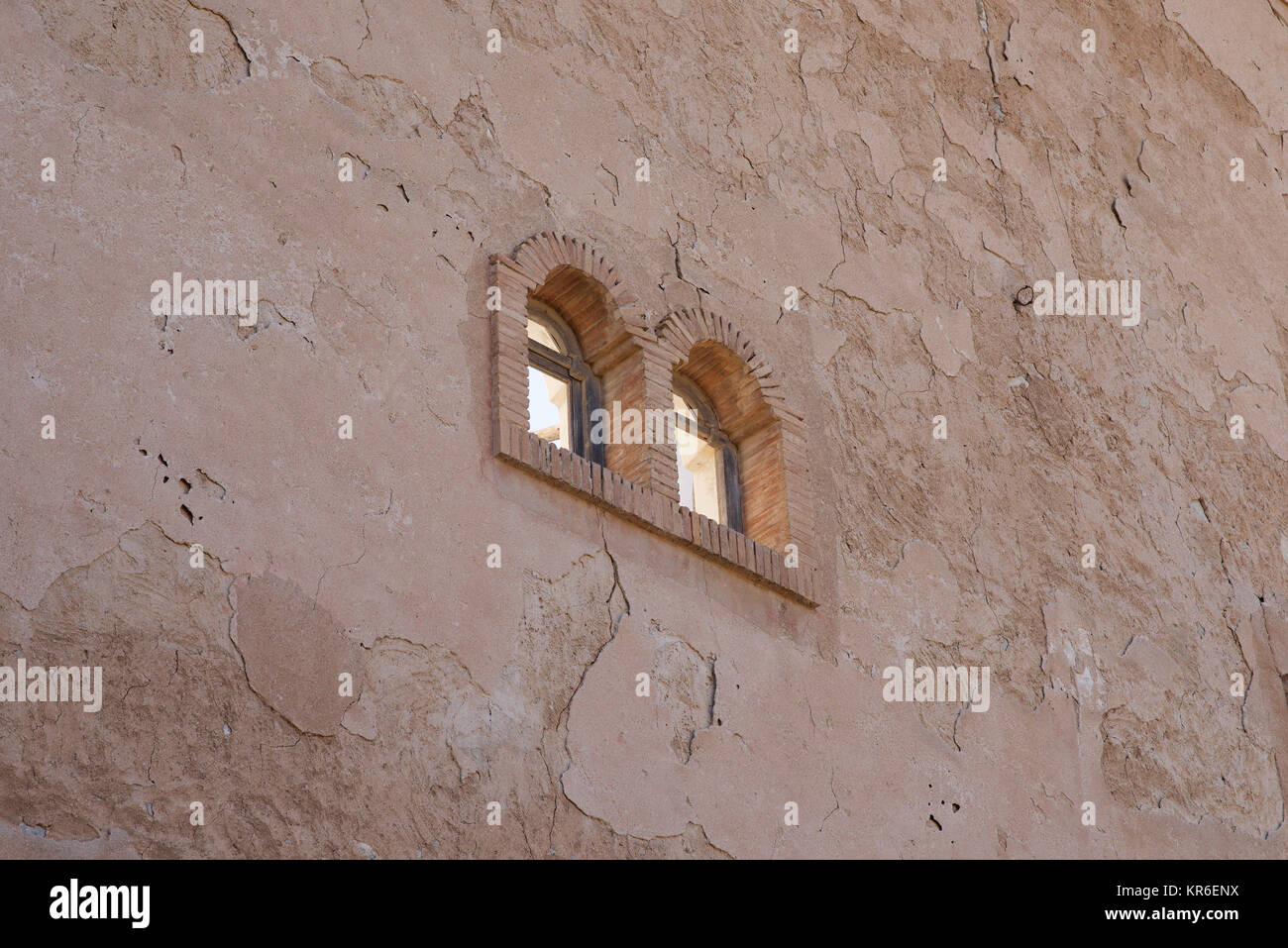 Two windows in an old abandoned building Stock Photo - Alamy