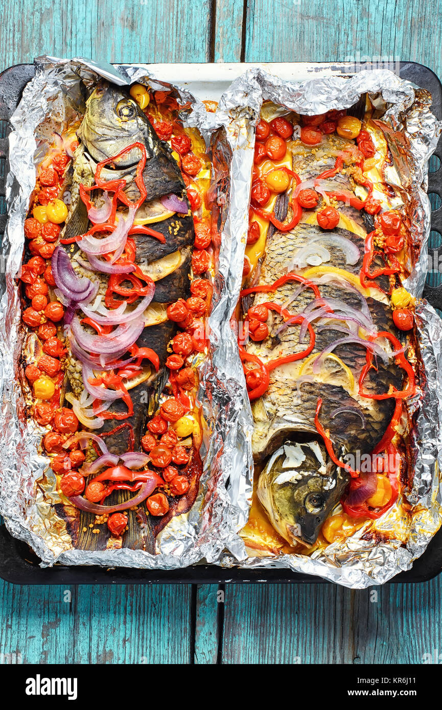 Baked In Foil Whole Fish Carp With Vegetables Stock Photo Alamy
