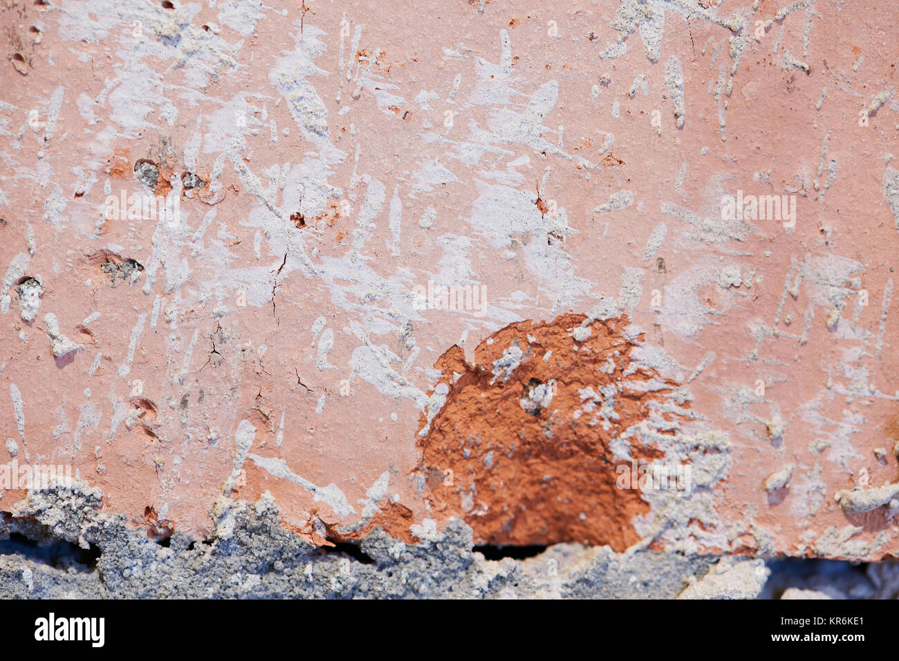 Close-up of red brick in wall.  Rough surface of red brick Stock Photo