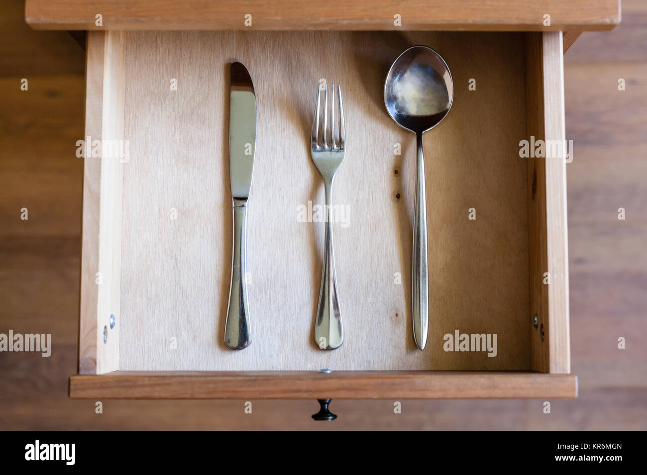 knife, fork, spoon in open drawer Stock Photo Alamy