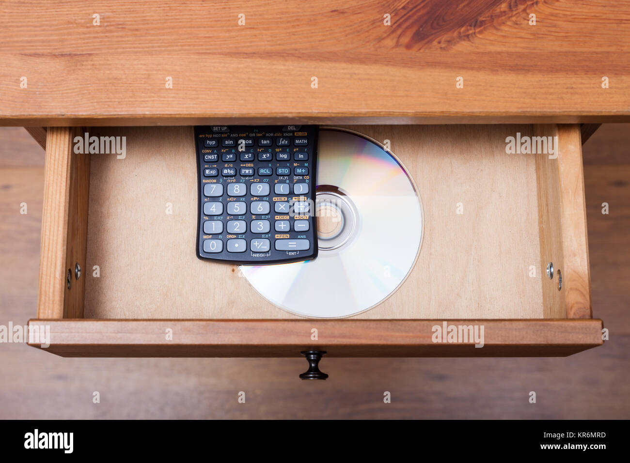 scientific calculator and disk in open drawer Stock Photo - Alamy