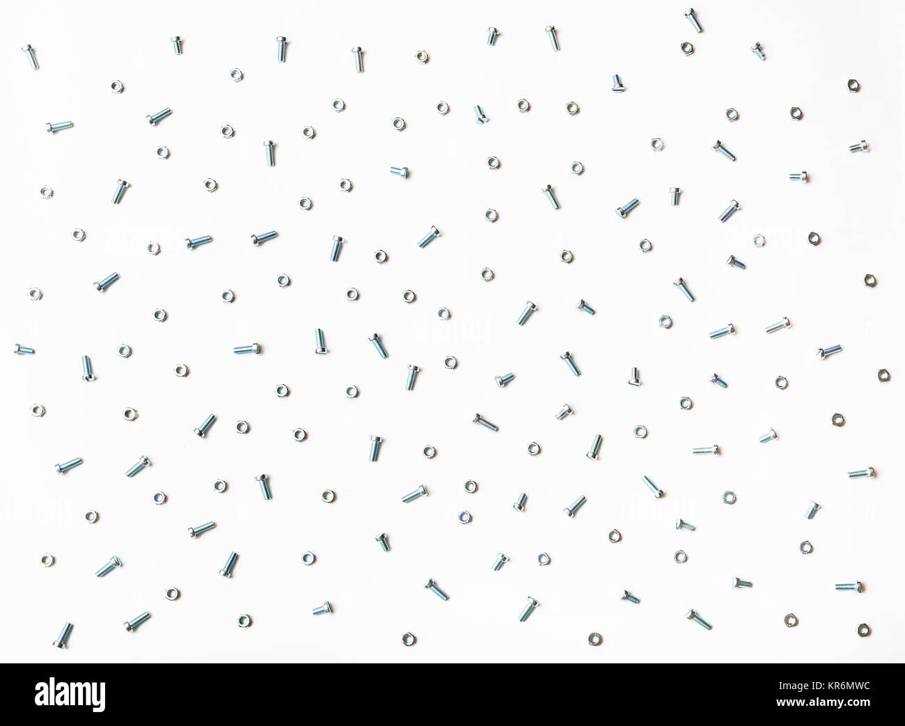many steel bolts and nuts arranged on white Stock Photo Alamy