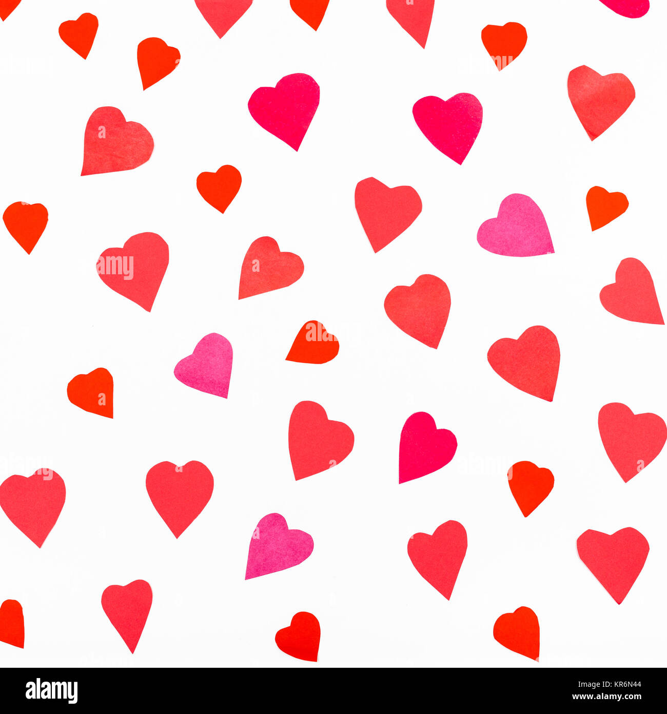 pink and red hearts cutout from color paper Stock Photo - Alamy