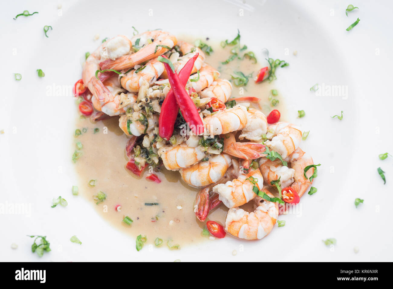 fresh mediterranean prawns in white wine garlic and chilli sauce tapas