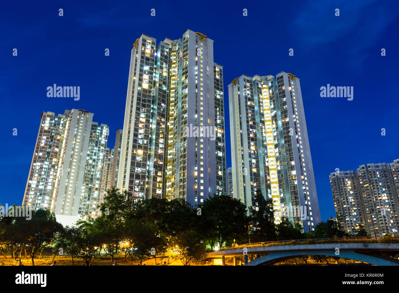 Hong Kong apartment building at night Stock Photo - Alamy