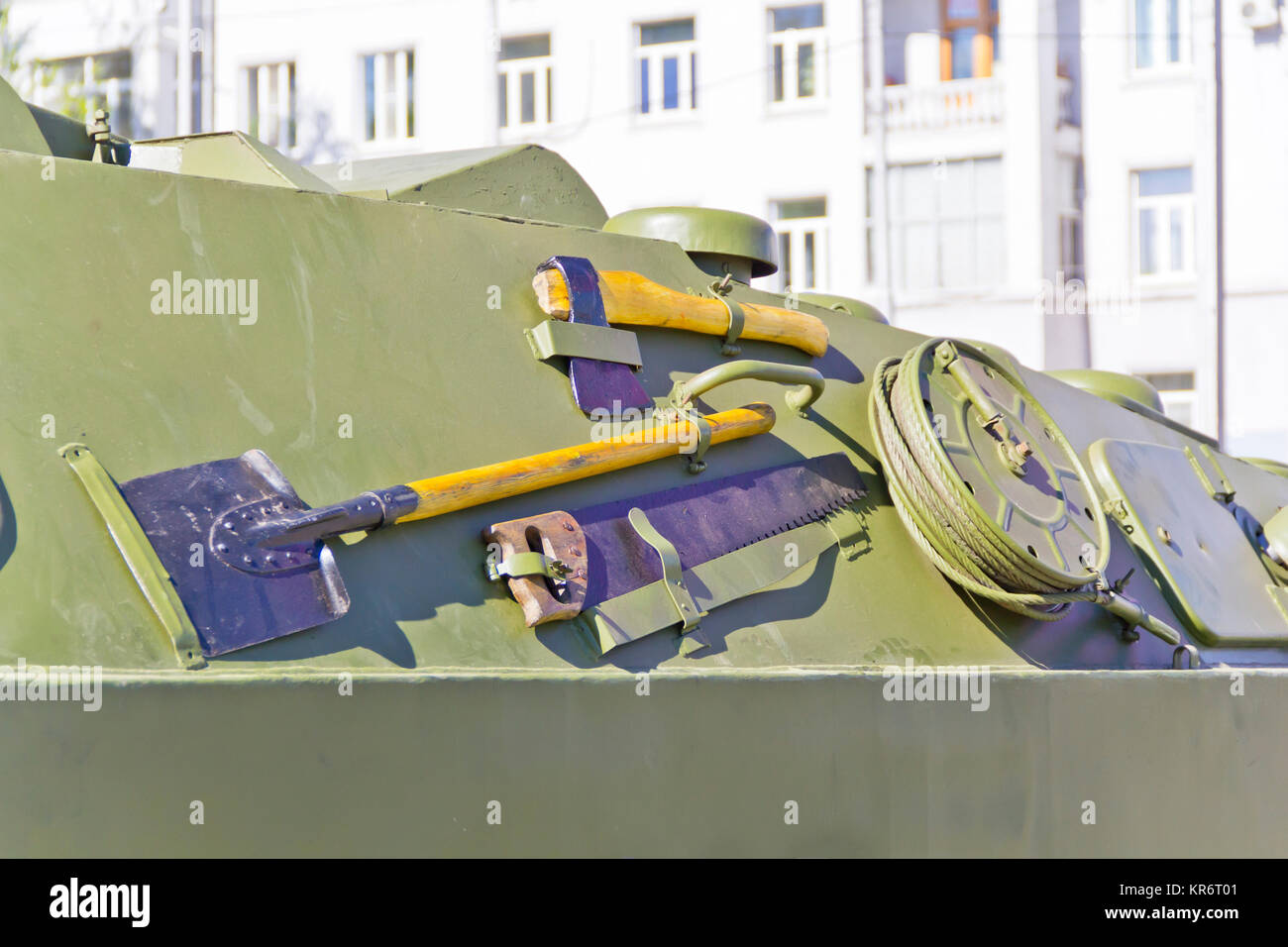 Military transport with shovel, ax and saw Stock Photo