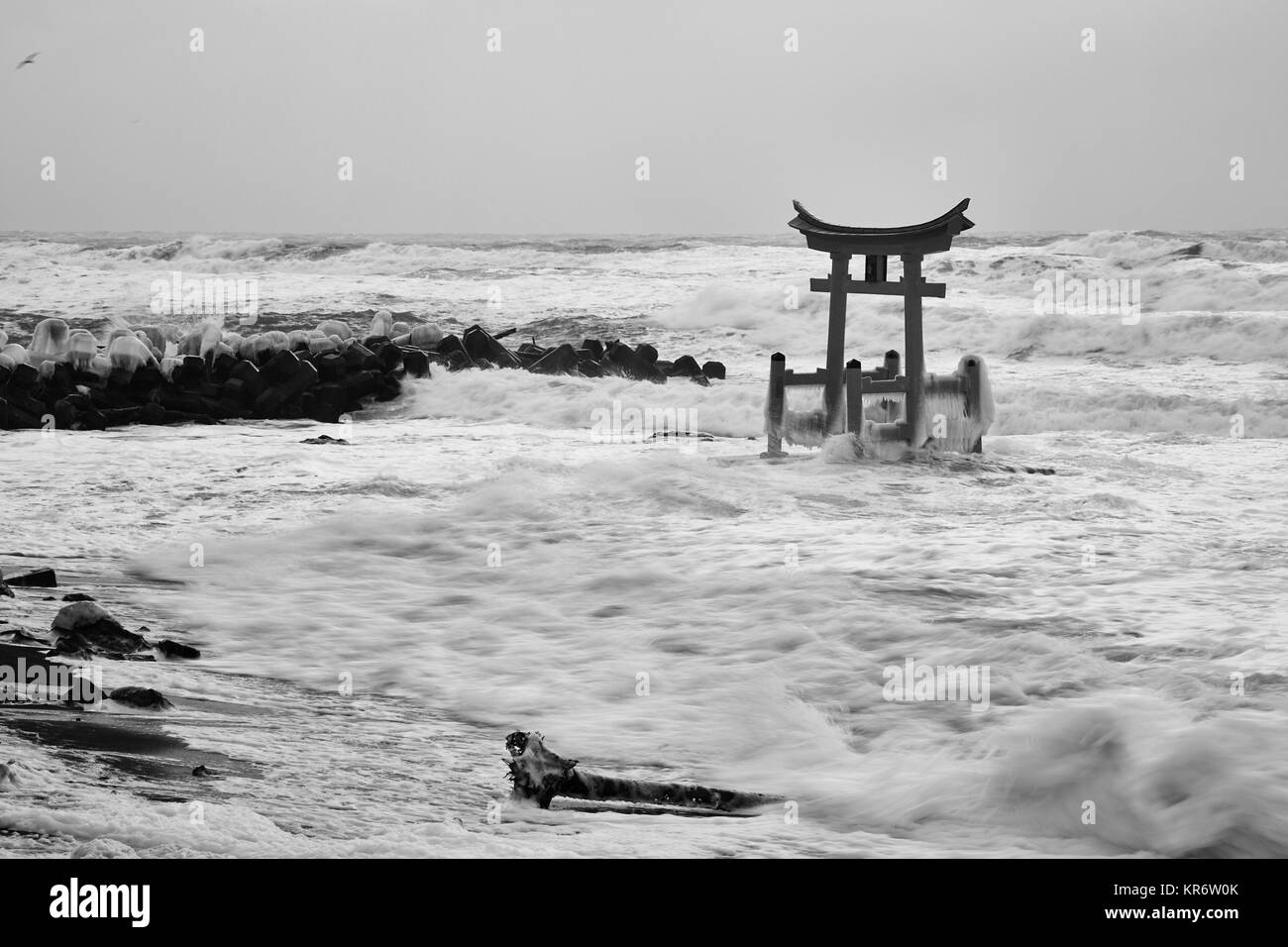 Traditional wooden torii gate in the ocean, Shosanbetsu Konpira Shrine. Stock Photo