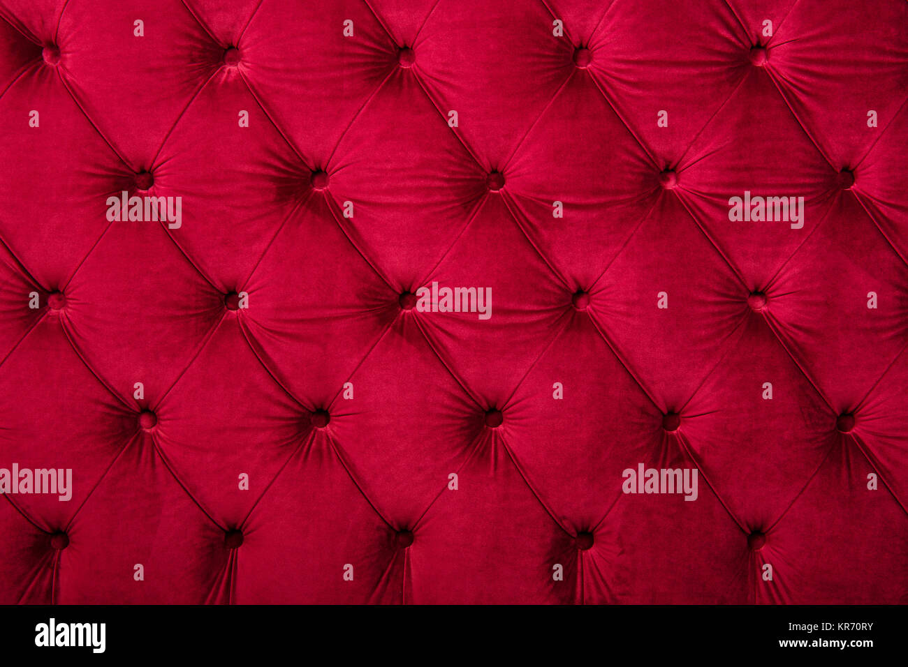 Red capitone tufted fabric upholstery texture Stock Photo Alamy