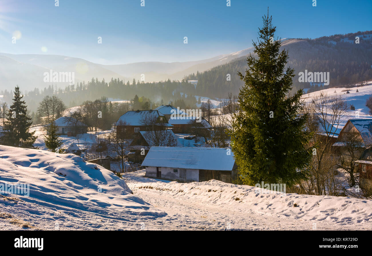 village in mountainous area in winter carpathian landscape. location Pylypets, Ukraine Stock Photo