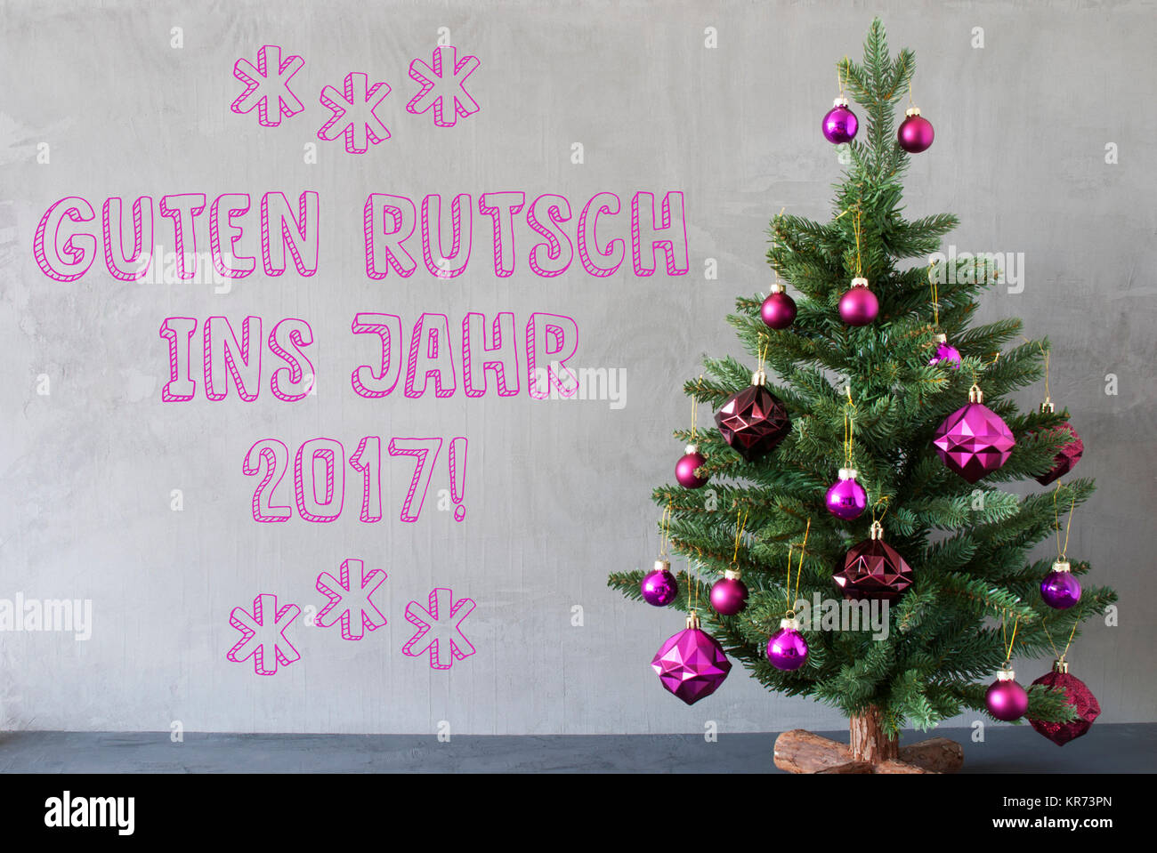 Christmas Tree With Purple Christmas Tree Balls. Card For Seasons Greetings. Gray Cement Or Concrete Wall For Urban, Modern Industrial Styl. German Text Guten Rutsch Ins Jahr 2017 Means Happy New Year Stock Photo