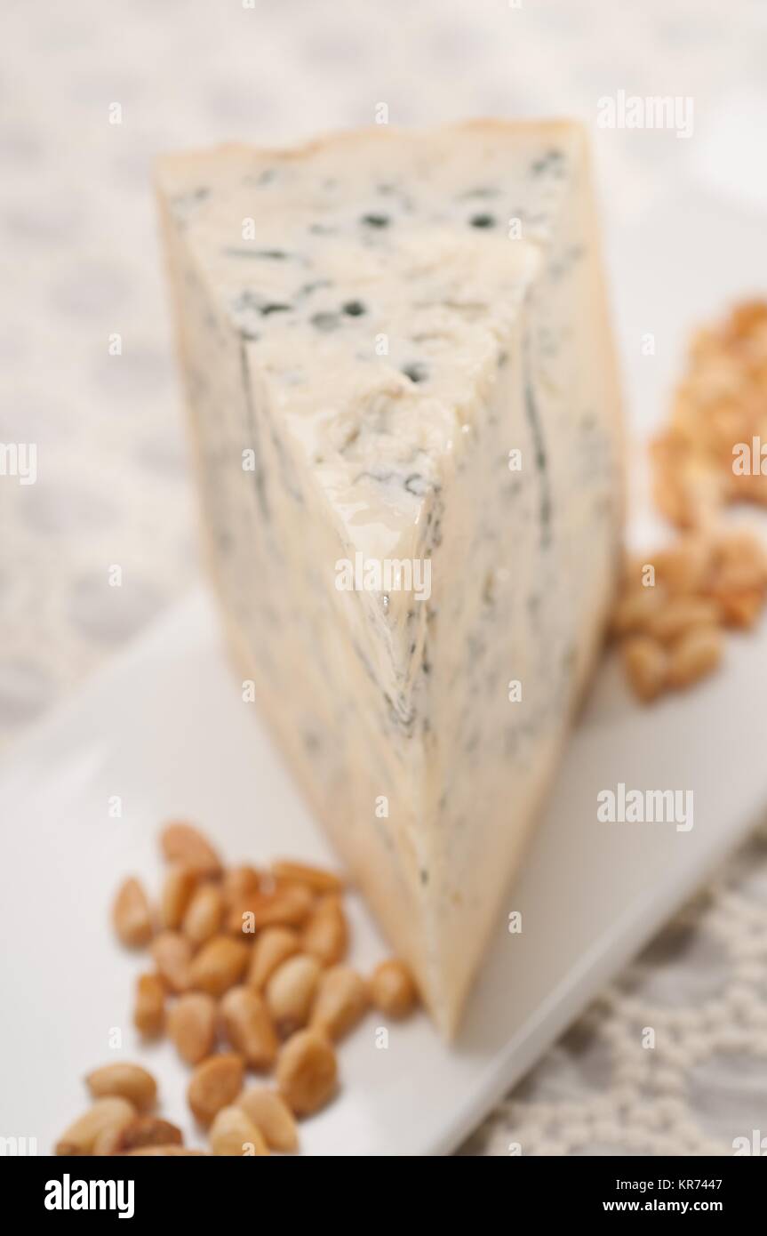 gorgonzola cheese fresh cut and pinenuts Stock Photo