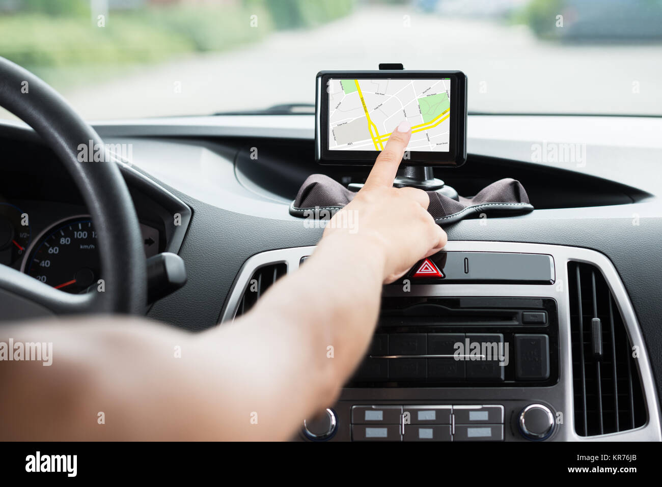 Female's Hand Using GPS Navigation Stock Photo - Alamy