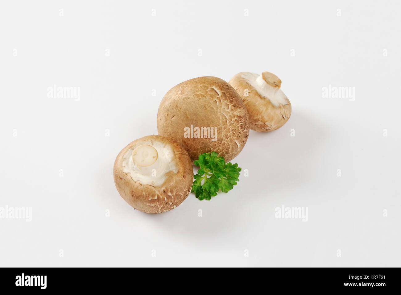 Raw cremini mushrooms Stock Photo Alamy