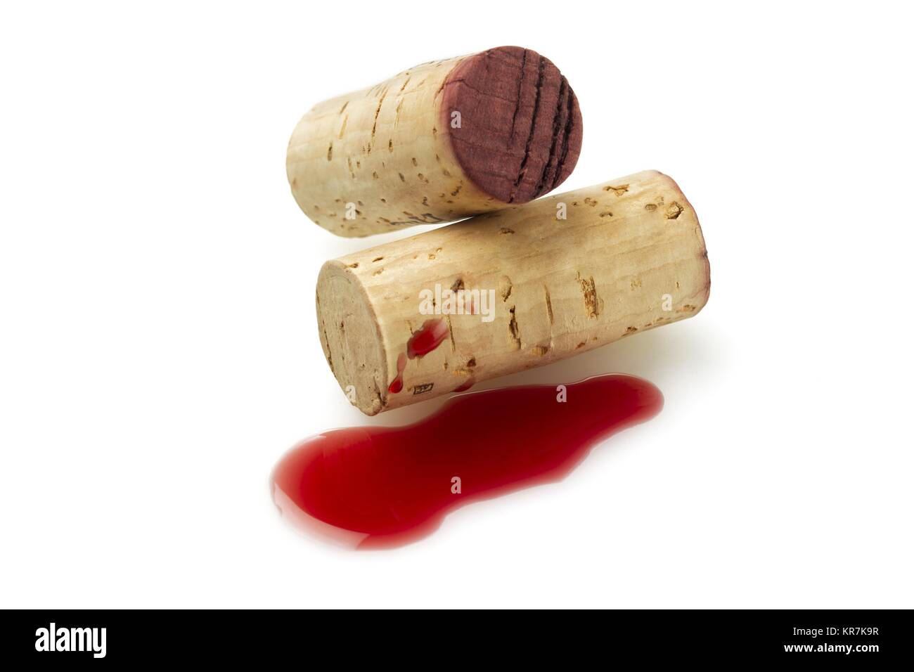 two bottle corks and red wine Stock Photo