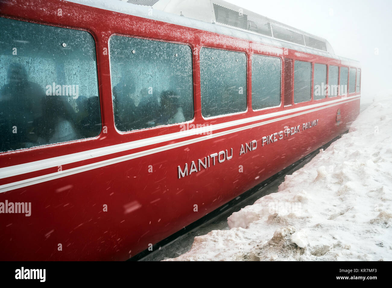 Railway cog car during unexpected snow storm in May, Pikes Peak  Colorado , USA, North America, United States Stock Photo
