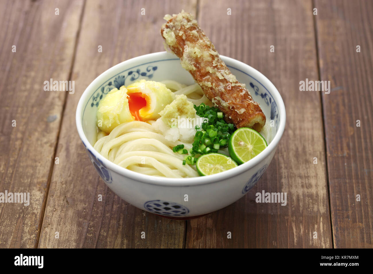 japanese cold Sanuki udon noodles on toppings with surimi tempura and soft boiled egg tempura