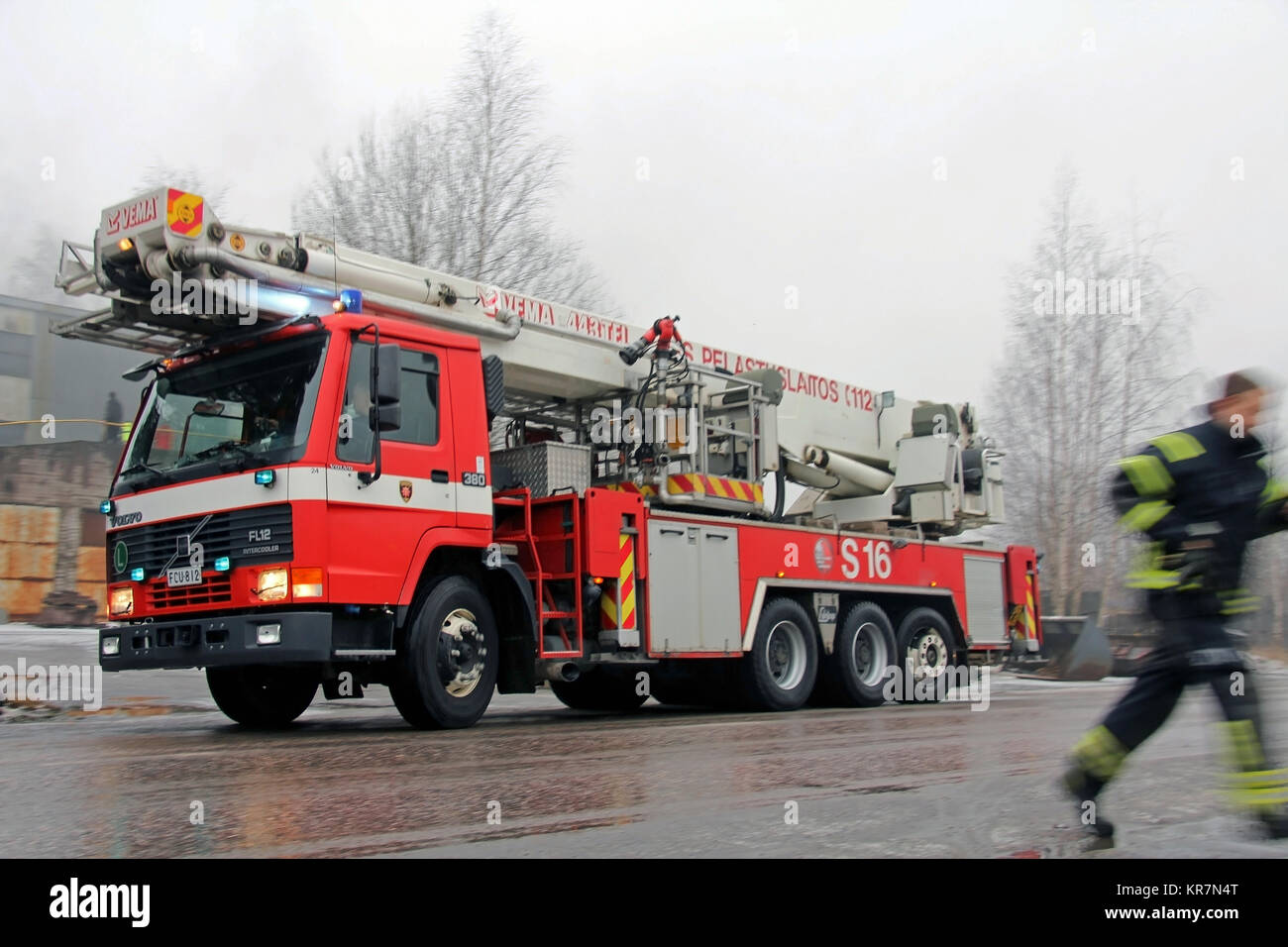 SALO, FINLAND - FEBRUARY 16, 2013: Fire Brigade arrives at the Cement Factory fire scene in Salo, Finland. Stock Photo