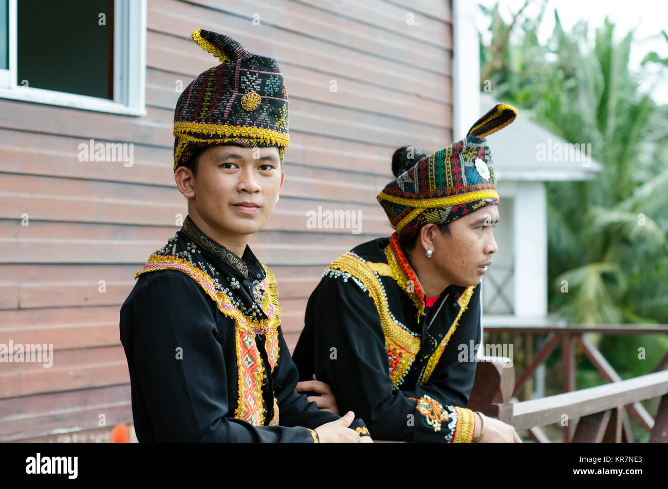 Young Men From Indigenous people of Sabah Borneo in East Malaysia in traditional attire during Musical and Dance Festival. Stock Photo