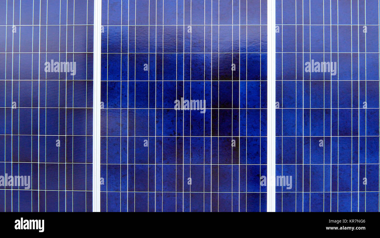 Blue Solar Panels or photovoltaics to generate solar energy. Stock Photo