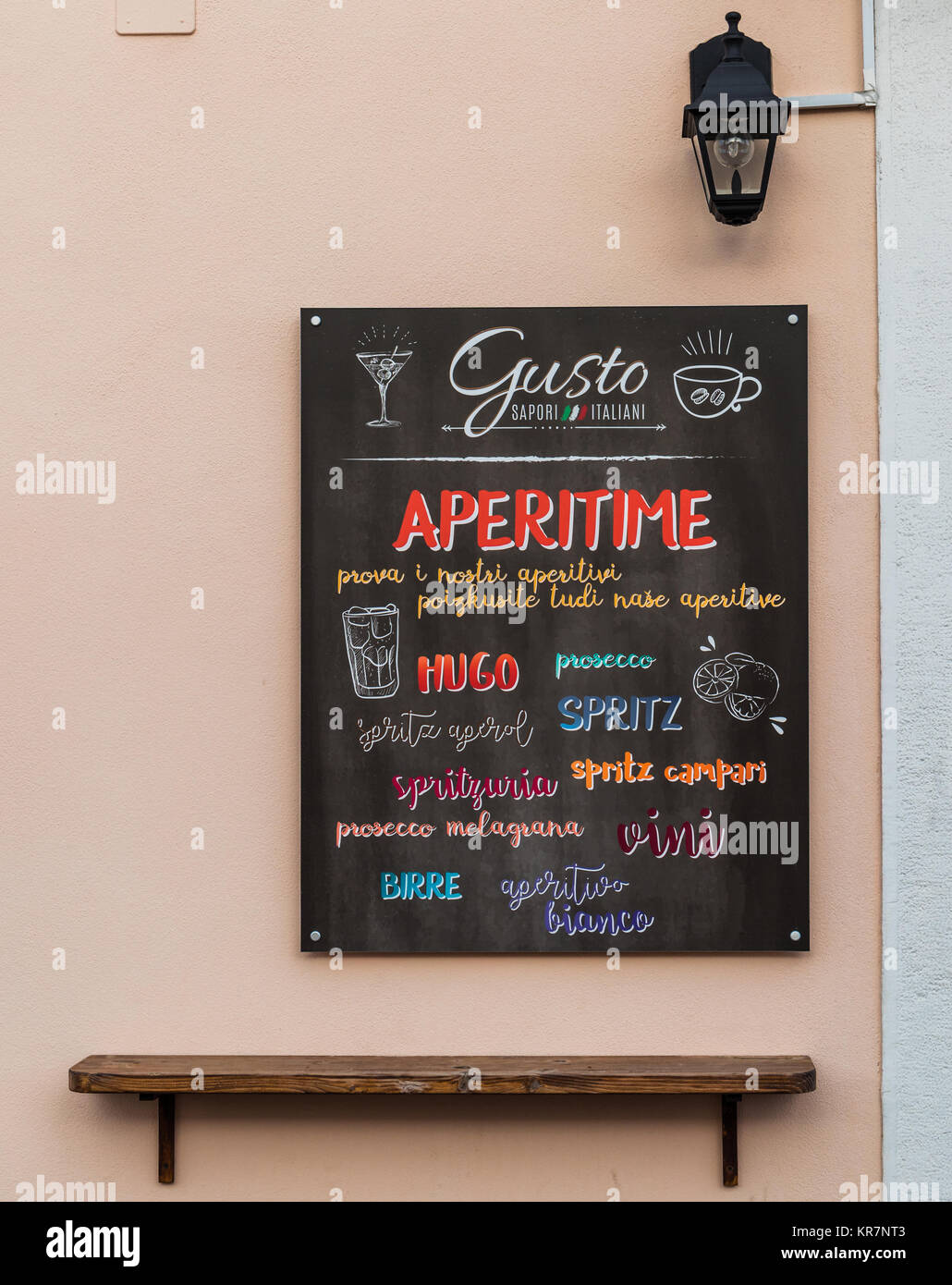 List of different alcoholic drinks on advertising board Stock Photo