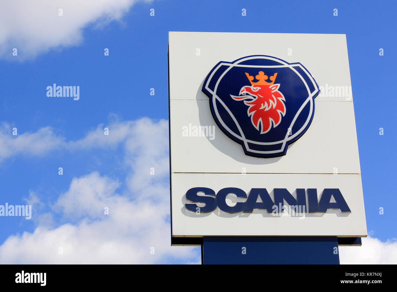 LIETO, FINLAND - AUGUST 3, 2013: Sign Scania against sky.The automotive industry manufacturer Scania AB was founded in 1891 in Sodertalje, Sweden. In  Stock Photo