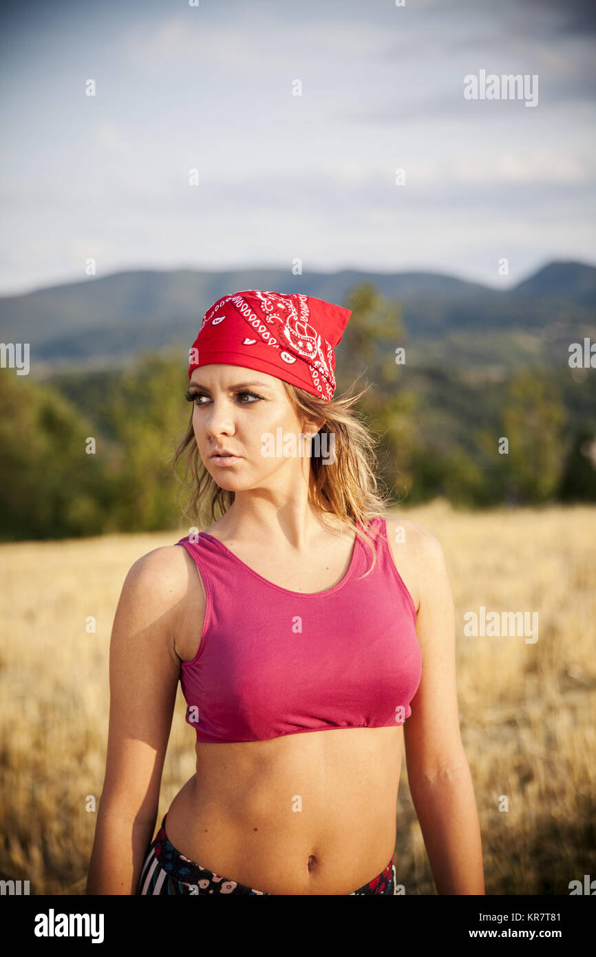 young beautiful woman exercise in nature Stock Photo