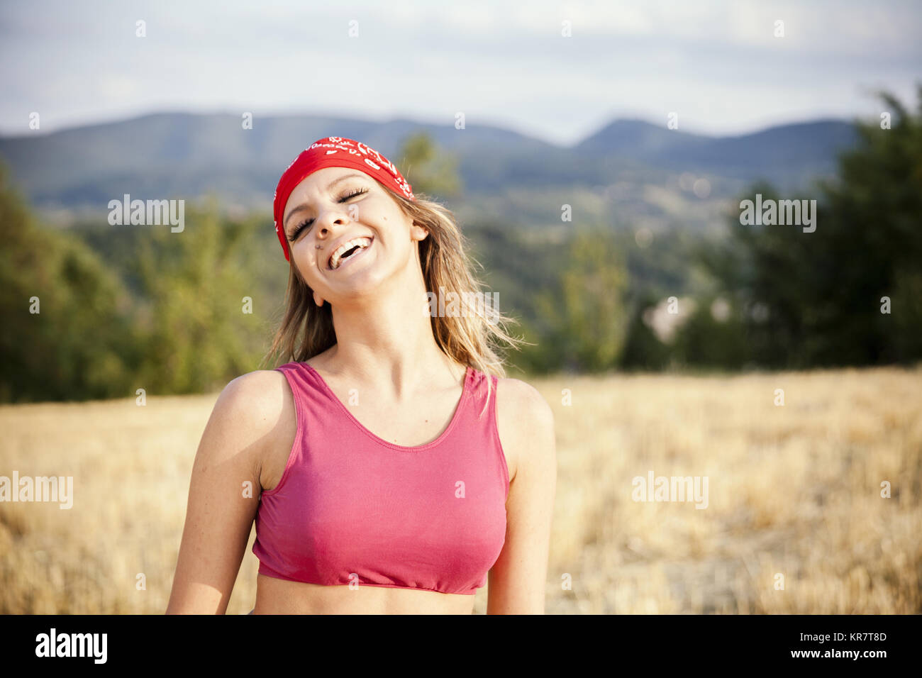 young beautiful woman exercise in nature Stock Photo