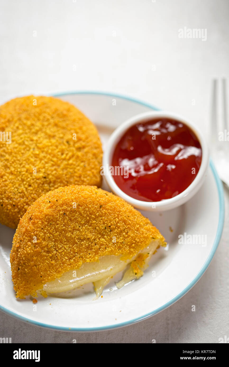 Breaded mozzarella with tomato dip Stock Photo Alamy