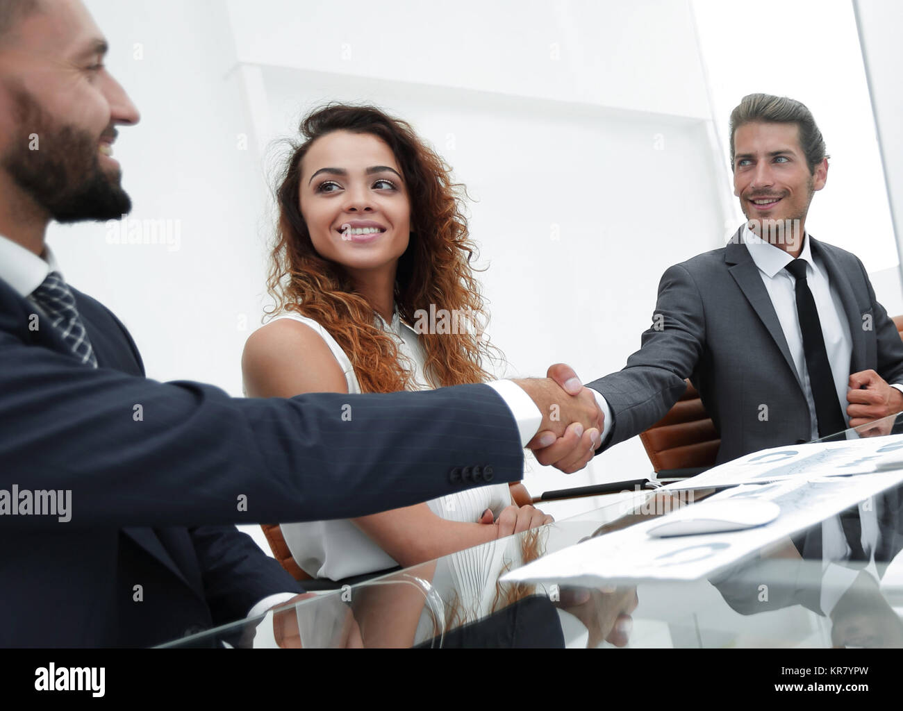 handshake colleagues at a working meeting Stock Photo - Alamy