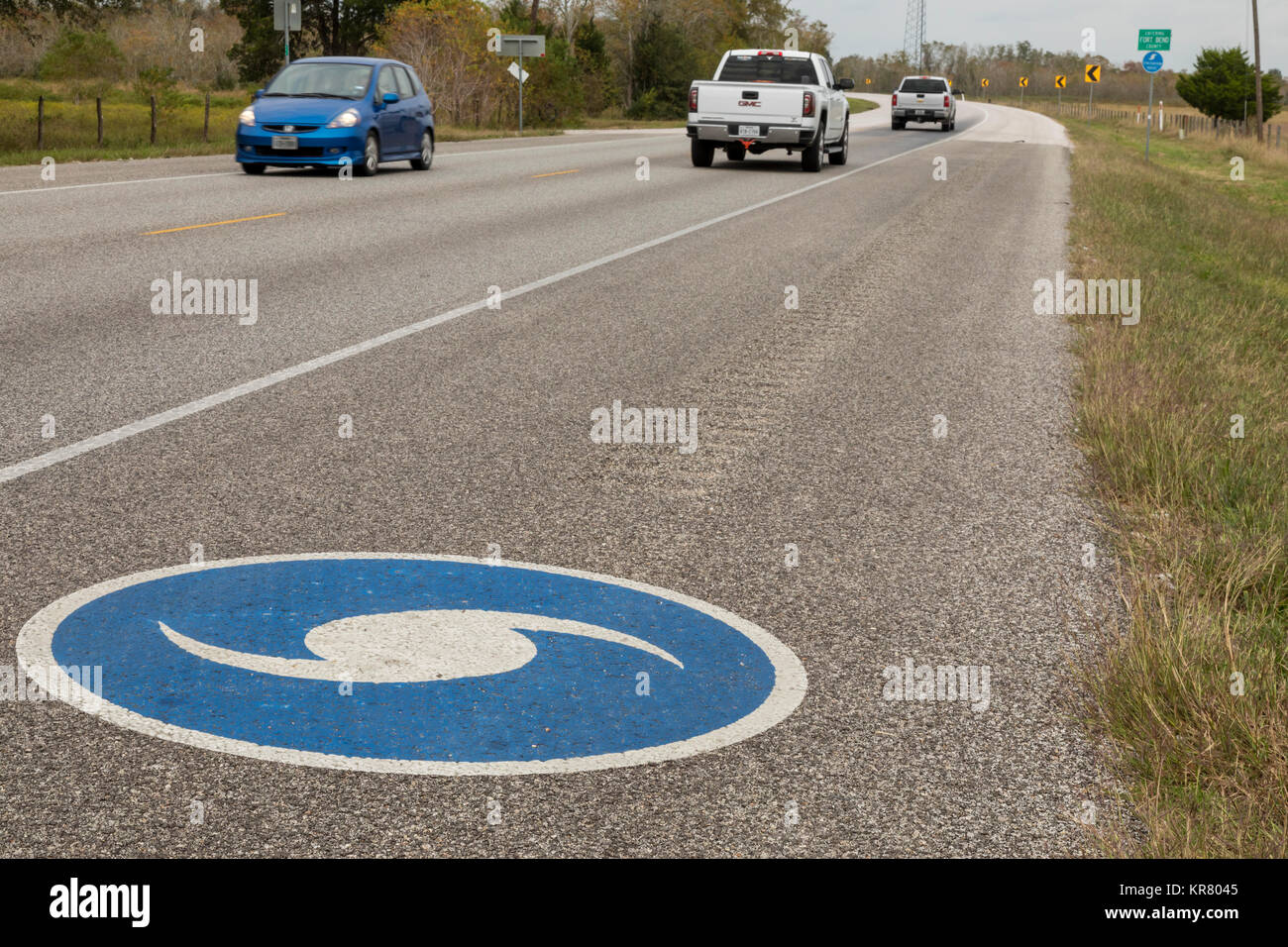 Guy, Texas - A hurricane symbol on state route 36 designates an emergency evacuation route near the Texas Gulf coast. Stock Photo