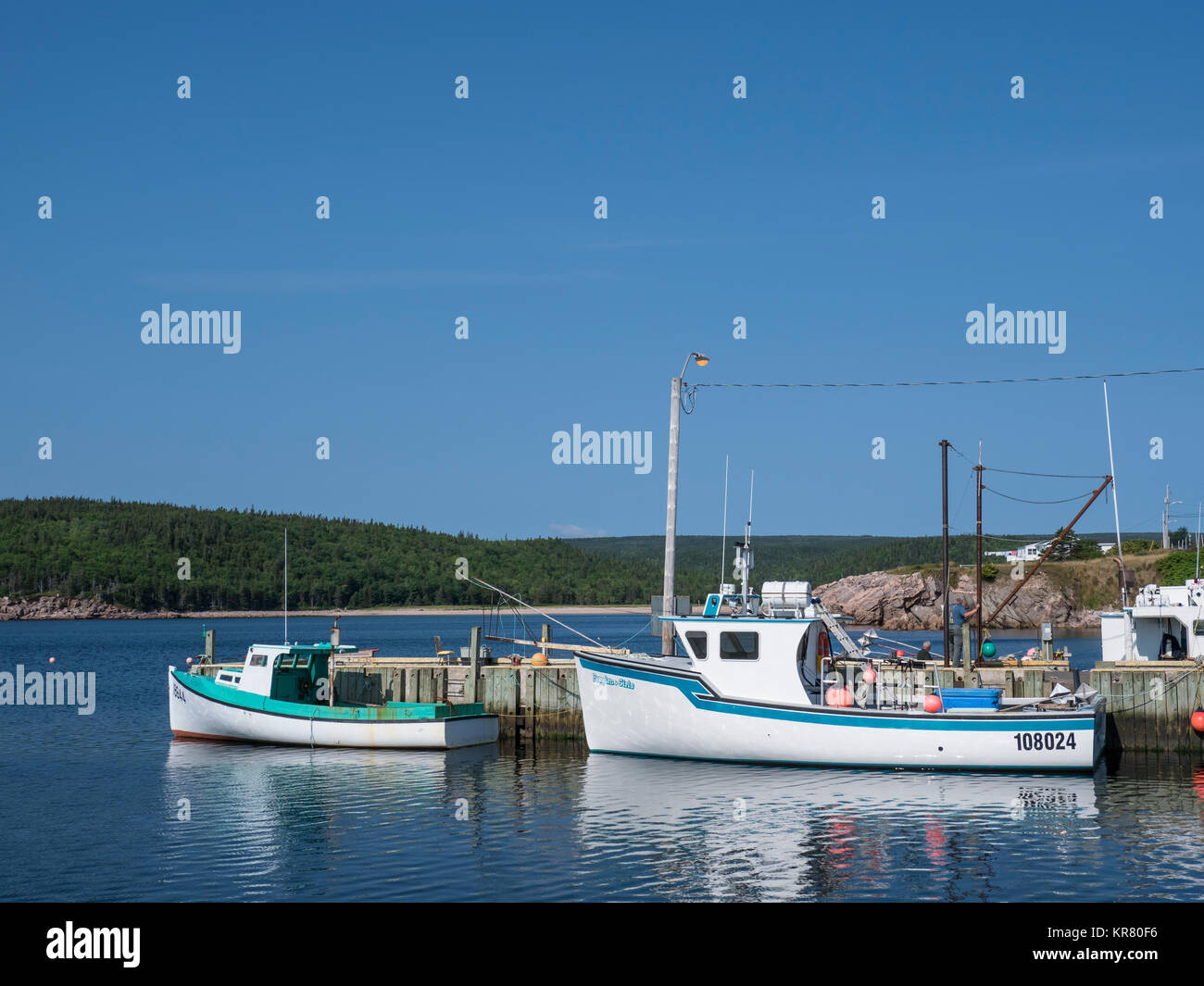 Fishing boats in the harbor, Neil's Harbour, Cape Breton Island, Nova Scotia, Canada Stock Photo