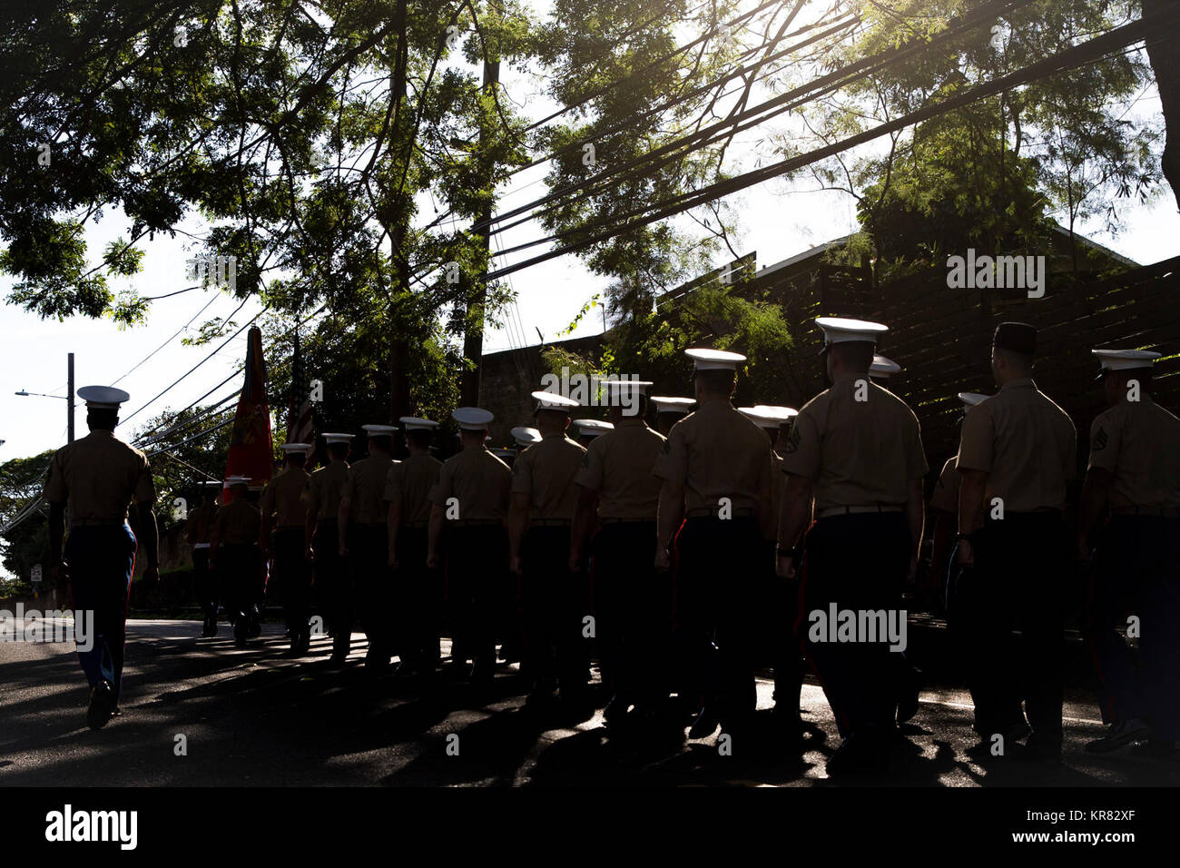 U.S. Marines with 3rd Battalion, 3rd Marine Regiment, march in the Waimanalo Christmas Parade